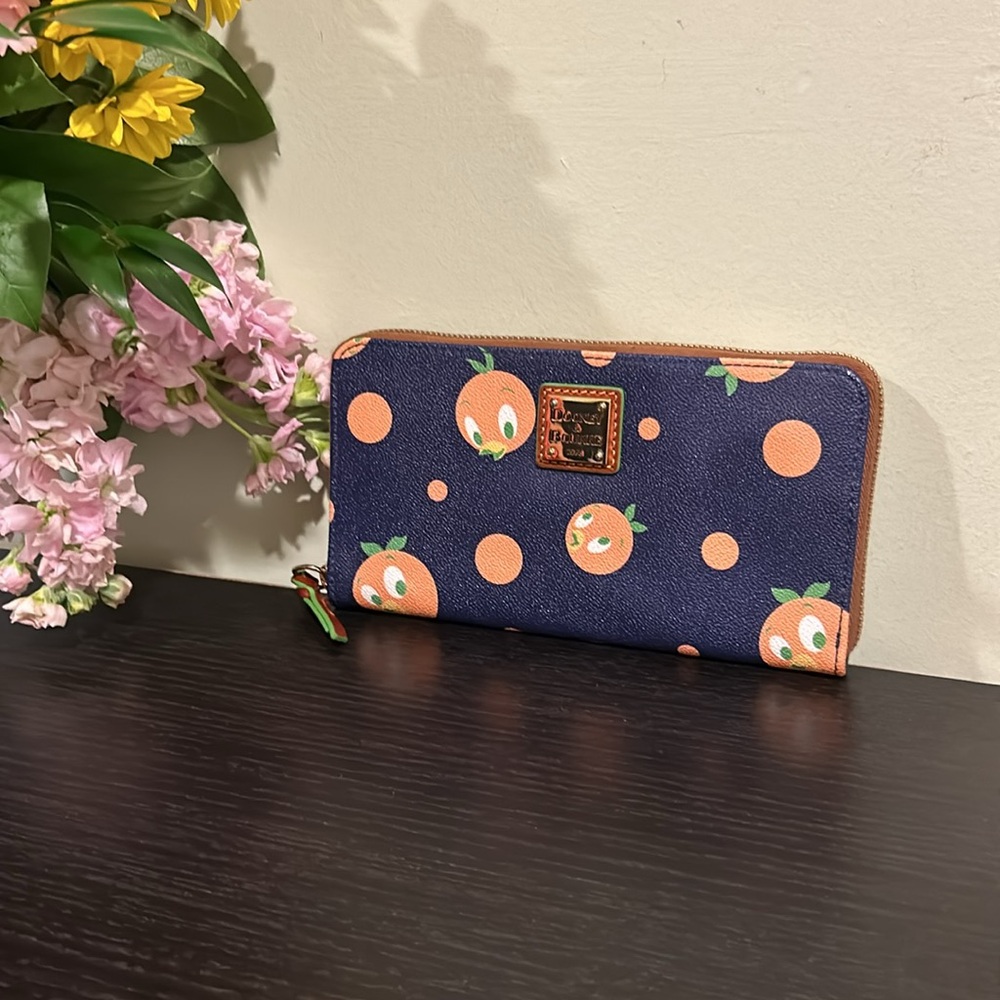 Dooney and Bourke zip around Orange bird wallet